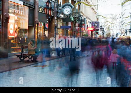 Váci street with blurred people Stock Photo