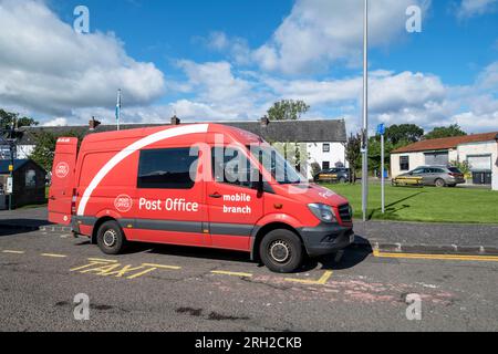 Mobile Post van serving customers in Drymen village in Stirling district, Scotland Stock Photo