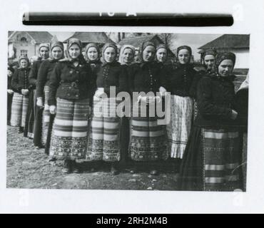 SS Photographer, Fritsch, Romania, Kavallerie, Russia 1943-44 Romanian honour guard, Romanian soldiers undergoing health physicals,  officers with Romanian officials and officers, farm scenes, villagers in traditional dress, recruiting activities, formal ceremony, individual portrait and group photos, soldiers field training, sports activities, officials in radio studio, local performers and cultural activities, soldiers in field with horses, assault guns, motorcycles, and signal equipment, burning village.  Images depicting the front-line activities of Waffen-SS units on the Western and Easte Stock Photo