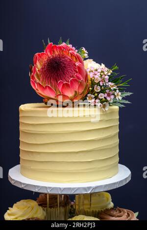 Wedding cake fresh flowers isolated Stock Photo