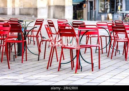Empty cafe tables and chairs in city center - Brussels, Belgium. Stock Photo