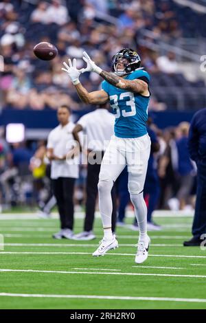 Jacksonville Jaguars wide receiver Jacob Harris (83) runs to catch a pass  during warm ups before an NFL football game against the Dallas Cowboys,  Saturday, Aug. 12, 2023, in Arlington, Texas. Jacksonville