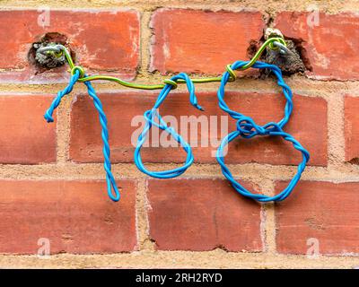 Temporary 168 house number made from electrical wire - Brussels, Belgium. Stock Photo