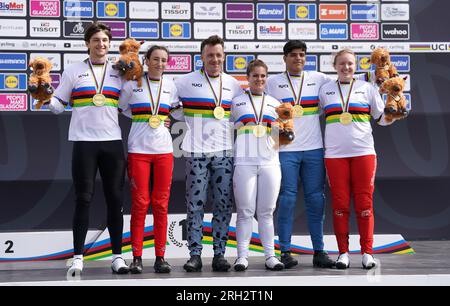 Switzerland's Filib Steiner (left), France's Tessa Martinez (second left), France's Romain Mahieu (centre left), Great Britain's Bethany Shriever (centre right), France's Romain Mahieu (second right) and Latvia's Veronika Sturiska pose with their gold medals after winning their respective categories during day eleven of the 2023 UCI Cycling World Championships at the Glasgow BMX Centre, Glasgow. Picture date: Sunday August 13, 2023. Stock Photo