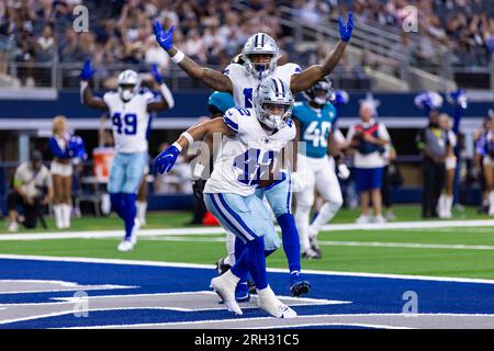 Dallas Cowboys running back Deuce Vaughn (42) runs with the ball during an  NFL pre-season football game against the Seattle Seahawks, Saturday, Aug.  19, 2023 in Seattle. (AP Photo/Ben VanHouten Stock Photo 