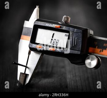 electronic Vernier caliper, close up measuring dimension Stock Photo