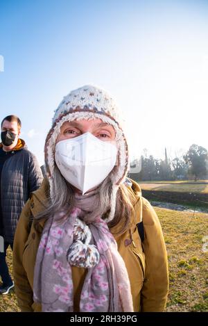 Woman Wearing FFP2 Face Mask During Covid 19 Restrictions Pandemic Coronavirus Stock Photo
