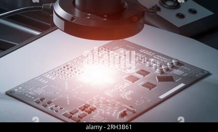 Close up of examining of test sample of microchip transistor under the microscope in laboratory. Equipment for testing microchips. Automation of produ Stock Photo