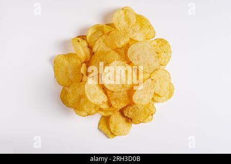 Small heap of chips on white background. Stock Photo