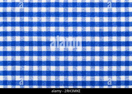 The texture of linen fabric in a large cage of blue and white. Scottish tailoring material Stock Photo