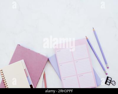 Top view home office desk on white background. Flat lay, top view minimal business template for social media, magazine, blog. Home office desk table w Stock Photo