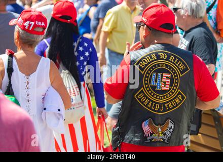 Des Moines, Iowa, USA - August 12, 2023: Supporters of former President Donald Trump gather to hear him speak at the Iowa state fair in Des Moines, Iowa, United States. Stock Photo