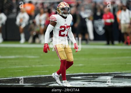 San Francisco 49ers safety Ji'Ayir Brown, left, tackles Las Vegas Raiders  running back Zamir White short of the goal line during the first half of an  NFL preseason football game, Sunday, Aug.