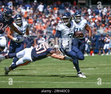 Chicago Bears linebacker Jack Sanborn (57) runs after the ball