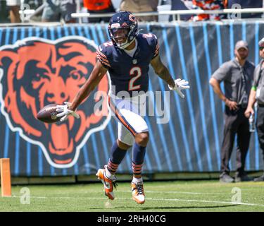 August 12, 2023, Chicago, Illinois, USA: Chicago Bears wide receiver DJ Moore (2) scores a touchdown off of a short pass during NFL preseason football game between the Chicago Bears vs the Tennessee Titans. Stock Photo
