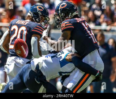 August 12, 2023 - Chicago Bears wide receiver Velus Jones Jr. (12) fumbles a punt during NFL preseason football game between the Chicago Bears vs the Tennessee Titans in Chicago, IL Stock Photo