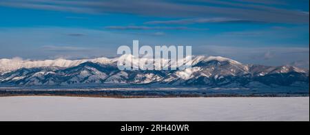 Panoramic view of The Bridger Mountain Range and the Gallatin Valley on a cold winter afternoon. Gallatin County, Montana, USA. Stock Photo
