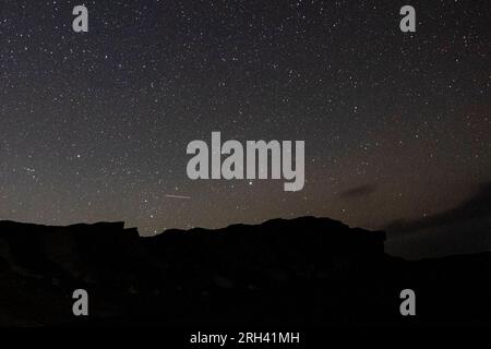 Faiyum, Egypt. 13th Aug, 2023. The Perseid meteor shower seen over the natural reserve area of Wadi Al-Hitan (Valley of the Whales) at the desert of Al Fayoum Governorate. Credit: Gehad Hamdy/dpa/Alamy Live News Stock Photo