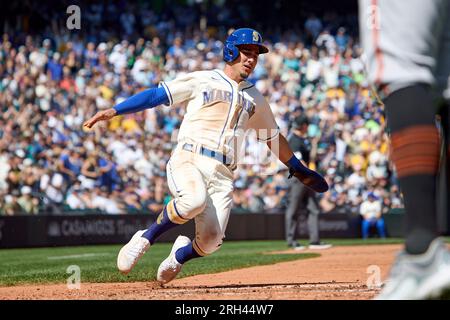 Seattle Mariners third baseman Eugenio Suarez throws to first base against  the Detroit Tigers in a baseball game, Saturday, July 15, 2023, in Seattle.  (AP Photo/Lindsey Wasson Stock Photo - Alamy