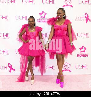 Canoga Park, California, USA. Queen Uche (Uche Umeagukwu), owner of Uche Hair (R), with daughter (L) dressed alike attending the Uche Hair Celebrates 12 Year Anniversary at Uche Hair located in Westfield Topanga Mall in Canoga Park, California. Credit: Sheri Determan Stock Photo