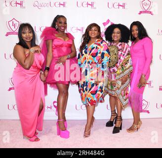 Canoga Park, California, USA. Queen Uche (Uche Umeagukwu), owner of Uche Hair (center), and guests attending the Uche Hair Celebrates 12 Year Anniversary at Uche Hair located in Westfield Topanga Mall in Canoga Park, California. Credit: Sheri Determan Stock Photo