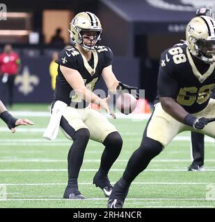 New Orleans Saints quarterback Jake Haener (14) runs through drills at the  NFL team's football training camp in Metairie, La., Friday, Aug. 4, 2023.  (AP Photo/Gerald Herbert Stock Photo - Alamy