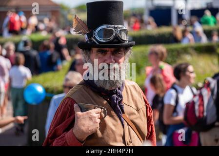 Broadstairs, UK. 13th Aug, 2023. A member of the Steampunk Morris poses for a photo in his tankard. Broadstairs holds this year the 57th Folk Week. It is one of the biggest folk festival in the UK. Hundreds of Morris dancers took the streets over and bands having gigs at the pubs. Credit: SOPA Images Limited/Alamy Live News Stock Photo