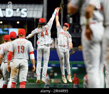Cincinnati Reds' Spencer Steer (7) places a viking helmet on the head of  Elly De La Cruz (44) after Cruz hit a home run during the second inning of  a baseball game