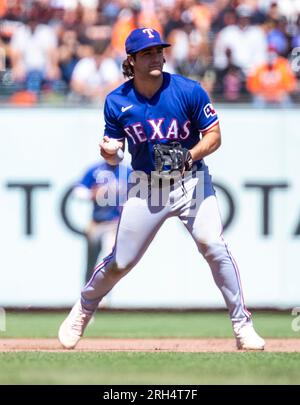 Texas Rangers shortstop Josh Smith (8) signs an autograph during the ...