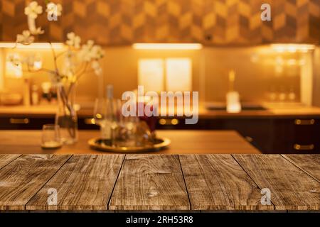 modern luxury kitchen black golden warm tone with wooden tabletop space for montage display utensil products. Stock Photo