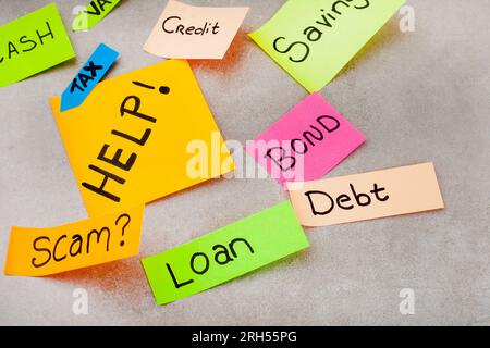 banking and finance words on sticky notes with grey surface Stock Photo