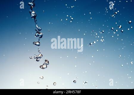 Water crown splash and wave swirl and drops. Vector liquid splashing aqua dynamic motion, blue water flow with spray droplets side view isolated on wh Stock Photo