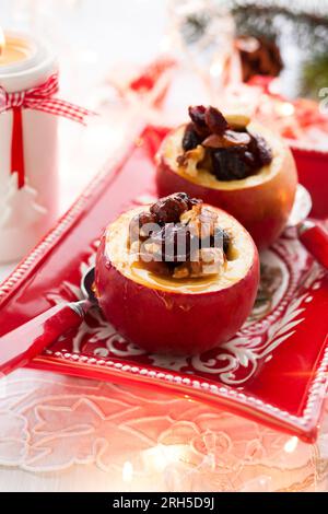 Baked apples stuffed with nuts and dried fruits Stock Photo