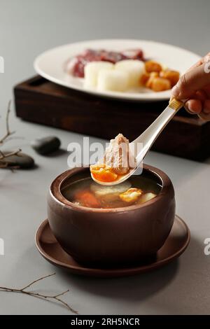 Korean shaved ice dessert with sweet toppings,  chocolate cookies Bingsu Stock Photo