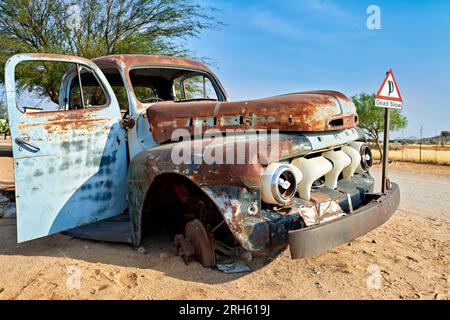 Namibia. Classic car wreck decaying in the desert Stock Photo - Alamy