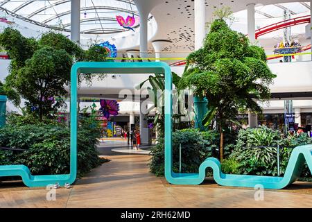 beautiful stylish interior with living plants in the mall Stock Photo