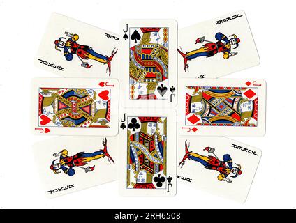 Vintage playing cards showing a display of jacks and jokers. Stock Photo