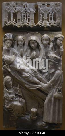 Relief depicting a scene from the Passion of Christ, 15th century. The Laying of Christ in the Tomb. Alabaster. From Nottingham Workshops (England). Carmo Archaeological Museum. Lisbon, Portugal. Stock Photo