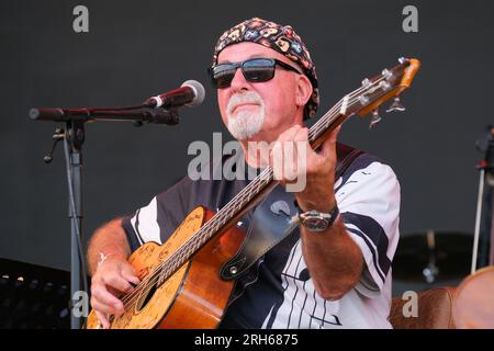 Dave Peggy Pegg of Fairport Convnetion performing at Fairports Cropredy Convention. August 10, 2023 Stock Photo