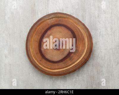 Empty rustic wooden board over wooden table. Stock Photo