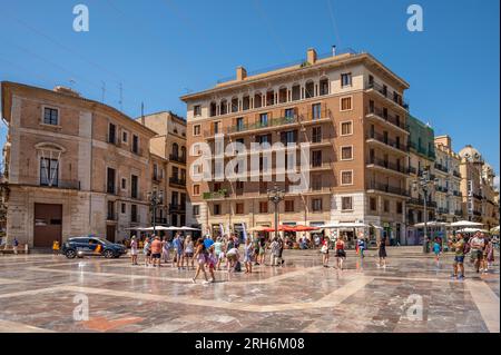 Valencia, Spain - July 25, 2023: Fountain Rio Turia on Square of the Virgin Saint Mary, Valencia Cathedral, Basilica of Virgen the Helpless. Stock Photo