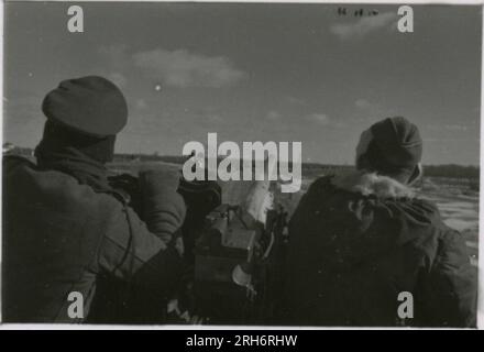 SS Photographer, Grönert, Hermann (Totenkopf, Russia and Italy 1943) Tiger I demonstration to Japanese officers; winter combat action with halftracks, flak gun mounted on halftrack, and StuG III;  Russian populace; many combat action photos of infantry in Russia with Tiger Is, StuG, Marder, and anti-tank guns; destroyed and captured Russian tanks; Russian prisoners of war; soldiers emplacing mines; assault guns and Tiger Is with infantry in Italy,  infantry training with mortars and a schwimmwagen crossing river Stock Photo