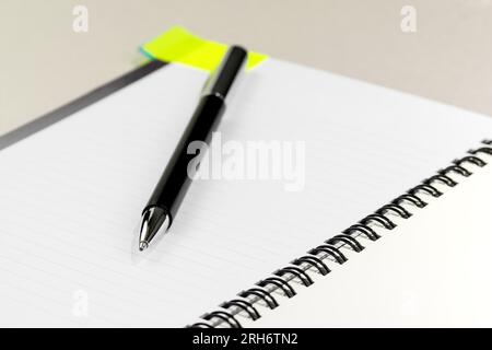 Close up shot of a notepad and pen with space to add text Stock Photo