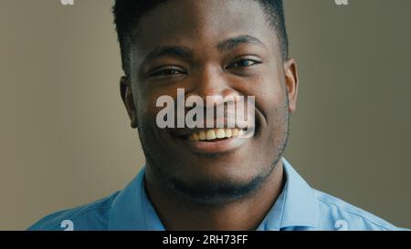 Business portrait ethnic african american adult 30s man smart businessman office employee boss CEO agent standing in company dreaming thinking turning Stock Photo