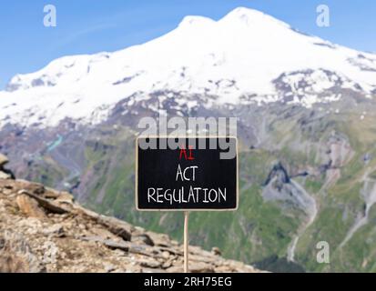 AI act regulation symbol. Concept words AI artificial intelligence act regulation on beautiful chalk blackboard. Beautiful mountain Elbrus background. Stock Photo