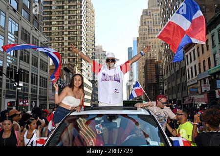 August 14, 2023, %G: (NEW) The 41st Annual Dominican Day Parade, August 13th, 2023, New York, USA. The National Dominican Day Parade in New York City is a parade organized by people of Dominican heritage in the city. The event started in 1982 as a local celebration with concerts and cultural events in the Washington Heights section of Manhattan. Organized by Dominican American community leaders, the parade is held annually each August on 6th Avenue.&#xA;Similar Parades take place in Similar parades are also held every year in Haverstraw, New York, Paterson, New Jersey, Boston, Lawrence, Massac Stock Photo