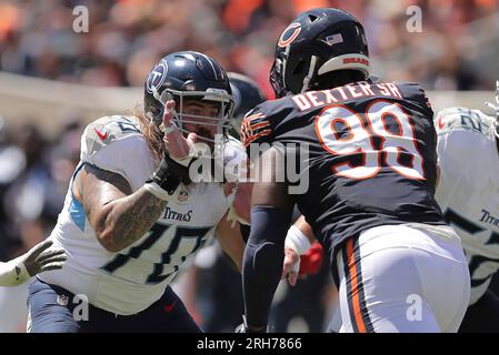 Gervon Dexter Sr. #98 of the Chicago Bears stretches during training  News Photo - Getty Images