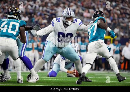 Cincinnati, OH, USA. 13th Dec, 2020. Dallas Cowboys defensive tackle  Neville Gallimore #96 breaks through between Cincinnati Bengals offensive  guard Quinton Spain #67 and Cincinnati Bengals offensive tackle Bobby Hart  #68 during