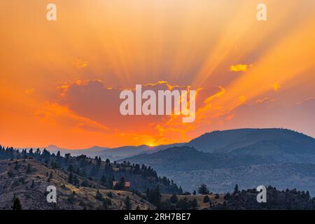 Amazing sunset over the Mountains near Yellowstone National Park north entrance Stock Photo