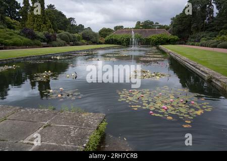 pond and fountain view from Wisley Gardens old building in August Stock Photo